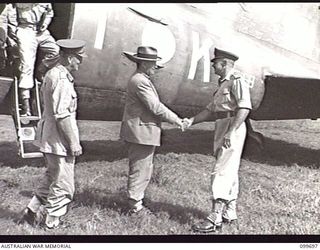 RABAUL, NEW BRITAIN, 1946-01-30. LIEUTENANT-GENERAL H. C. H. ROBERTSON, GENERAL OFFICER COMMANDING FIRST ARMY (1) INTRODUCING THE HONOURABLE F. M. FORDE, MINISTER FOR THE ARMY (2) TO MAJOR-GENERAL ..