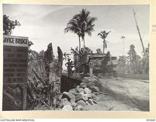 BOUGAINVILLE. 1945-05-30. THE SAVIGE BRIDGE CONSTRUCTED BY 11 FIELD COMPANY ROYAL AUSTRALIAN ENGINEERS, OVER THE JABA RIVER. THIS BRIDGE, MEASURING 620 FEET LONG AS A GUARD AGAINST FLOOD WATERS, ..