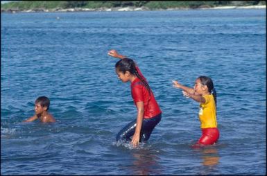 Group of children playing in water