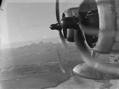 [View of propellers and landscape]