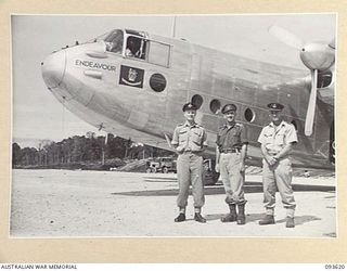 JACQUINOT BAY, NEW BRITAIN, 1945-07-03. WING COMMANDER D.R. DONALDSON (1), WITH LIEUTENANT-COLONEL E.A. GRIFFIN, ASSISTANT ADJUTANT AND QUARTERMASTER GENERAL 5 DIVISION (2), AND WING COMMANDER P.A. ..