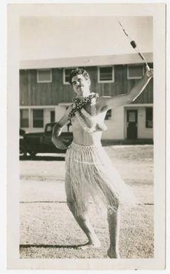[Tex Stanley Dressed as Hula Dancer]