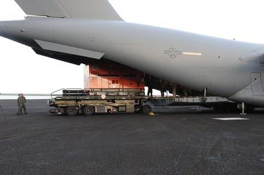 Earthquake ^ Tsunami - Pago Pago, American Samoa, October 2, 2009 -- FEMA generators are being unloaded from a C-17 military cargo plane. FEMA shipped generators from its warehouses to American Samoa to help provide electric power to critical facilities in American Samoa.