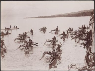 Solomon Islanders in canoes alongside the Southern Cross for trade at Graciosa Bay, Santa Cruz Islands, 1906, 2 / J.W. Beattie
