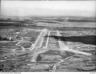 NADZAB, NEW GUINEA. 1944-02-15. AERIAL PHOTOGRAPH OF PARALLEL RUNWAYS AT ONE OF THE AIRSTRIPS AT THE ALLIED BASE