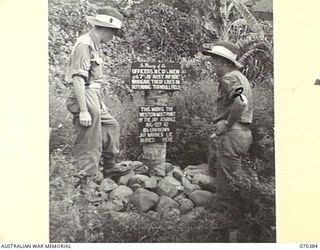MILNE BAY, NEW GUINEA. 1944-02-12. NX163937 CORPORAL R.G. MAHER (1); (INTELLIGENCE CORPORAL) AND VX112859 DRIVER W.J. CORR (2) (TRANSPORT SECTION), MEMBERS OF HEADQUARTERS, MILNE BAY BASE SUB AREA, ..