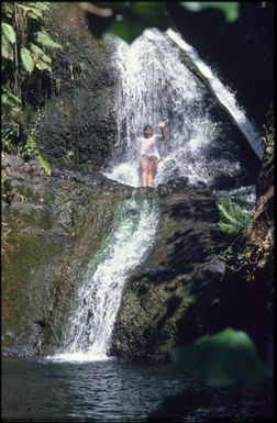 Woman in waterfall, Rarotonga