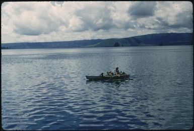 Coastline and Islanders in a canoe (3) : Bougainville Island, Papua New Guinea, 1960 / Terence and Margaret Spencer