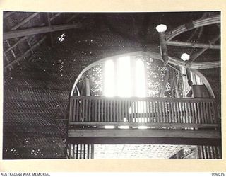 WUNUNG, NEW BRITAIN. 1945-09-04. THE BELFRY AND THE ORGAN LOFT THROUGH THE WINDOWS OF THE ALL SERVICES CHAPEL AT 105 CASUALTY CLEARING STATION. THE CHAPEL WAS BUILT BY 35 FIELD PARK COMPANY