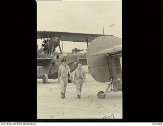 MADANG, NEW GUINEA. 1944-12-27. OLD, BUT STILL PLAYING AN IMPORTANT ROLE IN RESCUE AND COMMUNICATION WORK IN NEW GUINEA IS THE SUPERMARINE WALRUS AMPHIBIAN AIRCRAFT, AFFECTIONATELY KNOWN AS THE ..