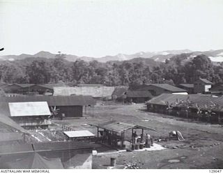 LAE, NEW GUINEA. 1945-12. CAMP AREA OF 4TH ADVANCED ORDNANCE DEPOT SEEN FROM THE WATER TOWER. (DONOR: J. W. K. BEDDOME)