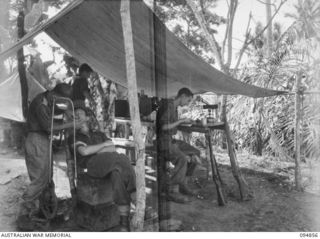 YAMIL SECTOR, NEW GUINEA, 1945-08-01. THE FRONT LINE DENTAL CENTRE, ESTABLISHED AT 2/6 INFANTRY BATTALION BY CAPT J.V. WILKINSON, DENTAL OFFICER, B SECTION, 2/4 DENTAL UNIT. THE UNIT PROVIDES ..