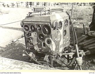 LAE AREA, NEW GUINEA. 1944-11-27. A CAPTURED JAPANESE AIRCRAFT PREDICTOR FOR USE IN CONJUNCTION WITH A 75MM GUN IN THE MUSEUM OF THE ASSISTANT QUARTERMASTER GENERAL (E) 1ST AUSTRALIAN ARMY