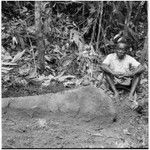 Polosokesa at the shrine of his mother's descent group, Nggolunggolu