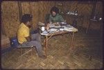 Western Highlands: anthropologist William Heaney interviewing another man