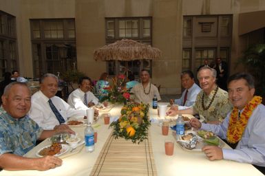 [Assignment: 48-DPA-K_lab810_Select] Secretary Dirk Kempthorne with [group including Resident Representative to the U.S. from the Northern Mariana Islands,] Pedro Tenorio [far left]; [American Samoa Lieutenant Governor] Faoa Aitofele Sunia [second from left, around the table]; [Palau President] Tommy Remengesau, Jr. [third from left]; [Interior Office of Insular Affairs Director] Nikolao Pula [fourth from left]; [Marshall Islands President] Kessai Note [fifth from left]; and Guam Governor Felix Camacho [far right], 5/09/2007 [48-DPA-K_lab810_Select_019.jpg]