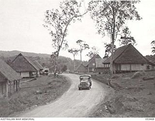 SOGERI VALLEY, NEW GUINEA. 1943-06-25. SECTION OF HOSPITAL MAINTAINED BY "A" COMPANY, 11TH AUSTRALIAN FIELD AMBULANCE SHOWING WARDS, STORES, DISPENSARY, RECREATION HUT AND LIVING QUARTERS. THIS ..