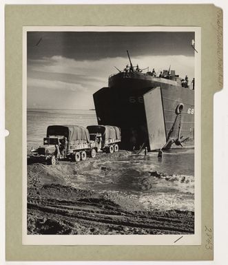 First Trucks Roll Out During Cape Sansapor Invasion