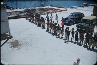 The labourers are lining up on the wharf : Port Moresby, Papua New Guinea, 1953 / Terence and Margaret Spencer
