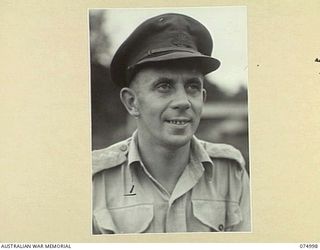 LAE, NEW GUINEA. 1944-08-03. VX117230 CAPTAIN N.H.J. WANSLEY, SECOND IN CHARGE, HEADQUARTERS, 8TH SALVAGE DEPOT