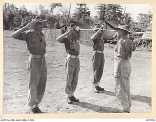 RABAUL, NEW BRITAIN, 1945-12-06. MAJOR R.B. COLE, OFFICER COMMANDING D COMPANY, 67 INFANTRY BATTALION, 34 BRIGADE GROUP, BRITISH COMMONWEALTH OCCUPATION FORCE (BCOF) (4), WITH HIS PLATOON ..