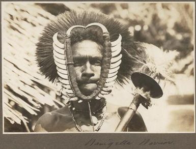 Wanigella [Wanigela] warrior [wearing mask] / Frank Hurley