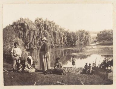 Woman and children by a lagoon, New Caledonia ca. 1878-79