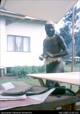 Man collecting ballot paper