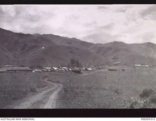 NADZAB, MARKHAM VALLEY, NEW GUINEA. 1944-03. UNIT NO 1 WIRELESS UNIT RAAF. MIDDLE FAR LEFT IS THE OPERATIONS BUILDING USED BY JAPANESE KANA WIRELESS INTERCEPT OPERATORS, LINGUISTS, TRANSLATORS, ..