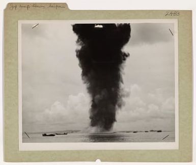 Photograph of a Column of Black Smoke Rising from a Japanese Oil Dump on the Shores of Saipan Island