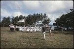 Christian Fellowship Church members with flags and music, Caucasians taking pictures