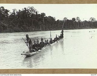 RAMU RIVER, FAITA AREA, NEW GUINEA. 1944-01-07. MEMBERS OF A PATROL OF THE 2/2ND COMMANDO SQUADRON RETURNING DOWN RIVER AFTER AN 8 DAY MARCH INTO JAPANESE HELD TERRITORY TOWARD BOGADJIM. SHOWN ARE: ..