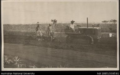 Ploughing with D4 Tractor