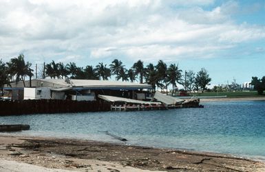 Trader Andy's Hut, a pierside bar and grill, displays damage sustained during an earthquake which struck the region on August 8th