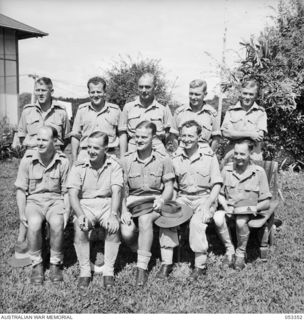 KOITAKI, NEW GUINEA. 1943-06-29. OFFICERS OF THE 2/2ND AUSTRALIAN CASUALTY CLEARING STATION. LEFT TO RIGHT: BACK ROW: VX9919 CAPTAIN J. D. GIBBS; NX8099 LIEUTENANT G. E. ROSS; NX77370 CHAPLAIN L. ..