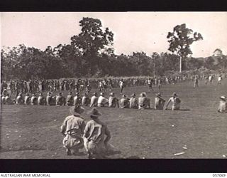 DONADABU, NEW GUINEA. 1943-09-19. A TRY HAS BEEN SCORED IN A RUGBY FOOTBALL MATCH BETWEEN THE 2/1ST AUSTRALIAN TANK ATTACK REGIMENT AND THE 61ST AUSTRALIAN INFANTRY BATTALION