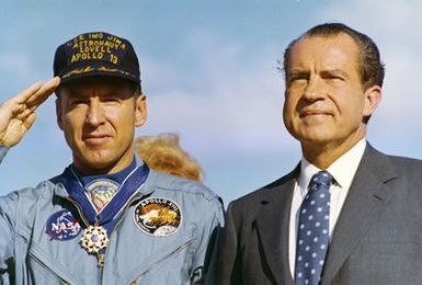 Photograph of Apollo 13 Flight Commander James A. Lovell, Jr. Standing alongside President Richard M. Nixon