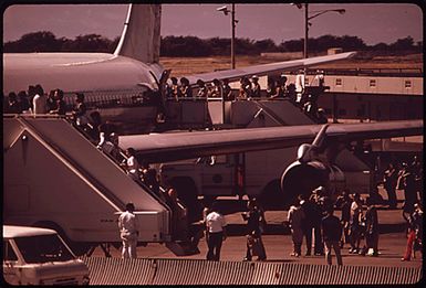 HONOLULU INTERNATIONAL AIRPORT HANDLES ALMOST ALL OF THE ISLAND'S VISITORS. SOME 2.7 MILLION ARE ANTICIPATED IN 1973