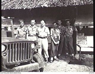 LAE, NEW GUINEA. 1944-08-19. THE OFFICER- IN- CHARGE AND STAFF OF THE MESSAGE CONTROL CENTRE AND THE SAFE HAND DESPATCH, HEADQUARTERS, NEW GUINEA FORCE. IDENTIFIED PERSONNEL ARE:- VX81110 ..