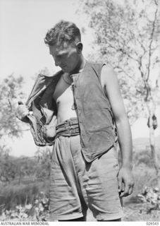 PAPUA, NEW GUINEA. 1942-09-07. BULLET PROOF VEST CAPTURED FROM THE JAPANESE AT MILNE BAY. MADE OF CLOTH, IT HAS SIX SHEETS OF BULLET PROOF STEEL COVERING THE FRONT, THE SHEETS BEING LET INTO THE ..