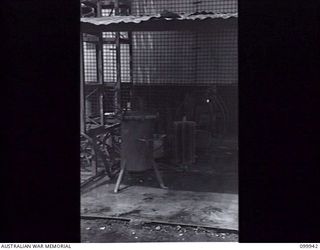 RABAUL, NEW BRITAIN, 1946-03-29. A SECTION OF THE WATER PURIFICATION MACHINERY AT THE AUSTRALIAN ARMY CANTEENS SERVICE CORDIAL FACTORY. THE FACTORY IS STAFFED BY SEVEN SKILLED ARMY PERSONNEL, A ..