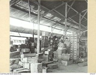 LAE, NEW GUINEA. 1944-09-27. EQUIPMENT UNDER STORAGE AT THE 43RD FIELD ORDNANCE DEPOT