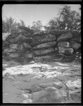 Stone wall, possibly part of a shrine