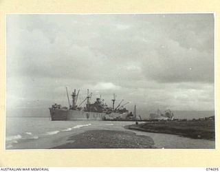 LAE, NEW GUINEA. 1944-07-13. A UNITED STATES "LIBERTY" SHIP BERTHED IN THE HARBOUR