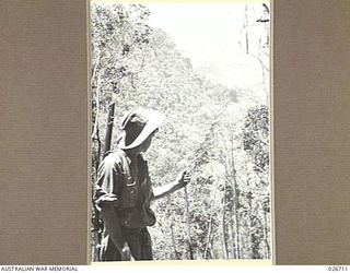 PAPUA. 1942-09. LOOKING OUT ACROSS THE DEEP VALLEYS TOWARDS EURIBAIWA ON THE KOKODA TRACK, FROM A POINT WHERE THE ROAD ENDS AND THE DESCENT BY FOOT TRACK COMMENCES