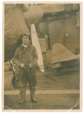 [Japanese Pilot Standing Next to a Plane]