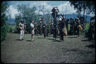 We pause, waiting for the bridegroom: Dr Spencer and Marie Reay in left foreground : Wahgi Valley, Papua New Guinea, 1955 / Terence and Margaret Spencer