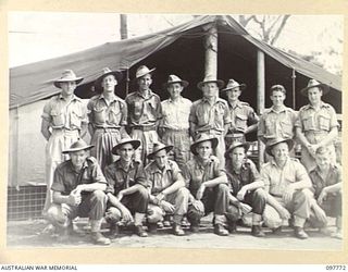 RABAUL, NEW BRITAIN. 1945-10-04. THE CAMP OFFICE STAFF, INCLUDING CANTEEN AND POSTAL MEMBERS, AT HEADQUARTERS 11 DIVISION