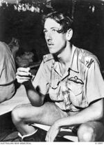 1942-12-05. PAPUA. ADVANCED FRONT. PILOT OFFICER NEIL HUTCHINSON, NO. 4 SQUADRON RAAF, OF MILDURA, JUST IN FROM AN OBSERVATION FLIGHT OVER BUNA