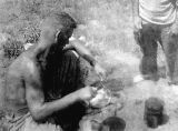 John Gunderson cooking on Guadalcanal, 1940s